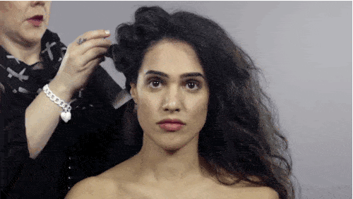 peinado y maquillaje de una modelo